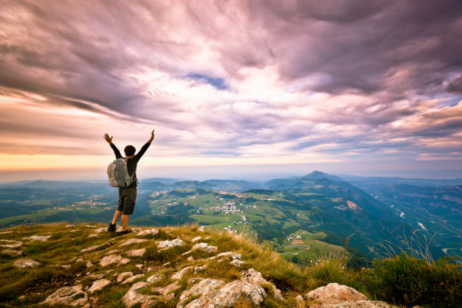 Hiker on top of the Mountain, Success Freedom Concept